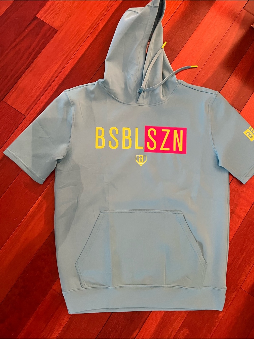 BSBL SZN Light Blue Short-Sleeve Hoodie with Neon Graphic